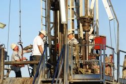 Oil workers on a rig